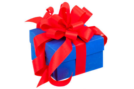 blue gift box with red ribbon and bow isolated on whiteの写真素材