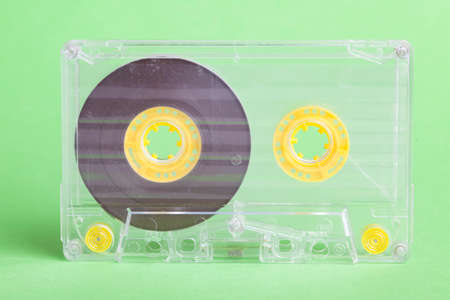 Audio cassette on green backgroundの写真素材