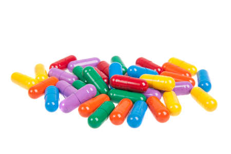 variety of colorful pills isolated on whiteの写真素材