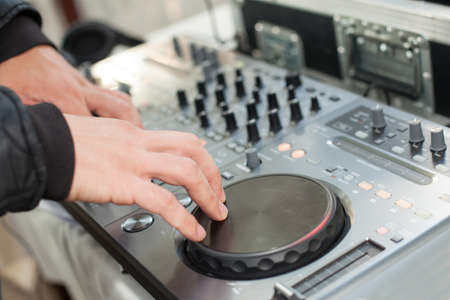 Dj mixes the track at partyの写真素材