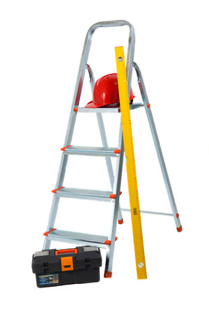 step-ladder with toll box and hard hat isolatedの写真素材