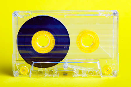 Audio cassette on yellow backgroundの写真素材