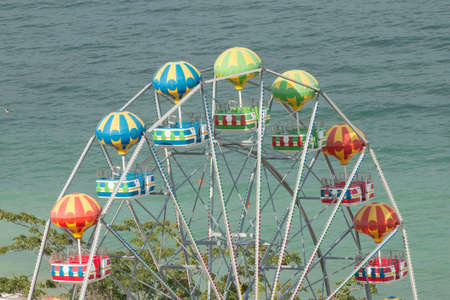 Close-up of colorful ferris wheel の写真素材