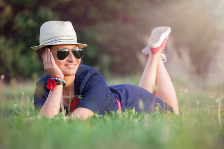 Beautiful woman enjoying in the parkの写真素材