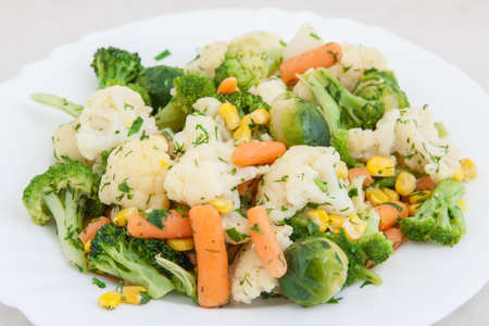 cooked vegetables in white plateの写真素材
