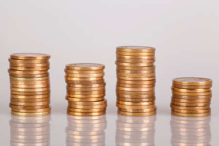 gold coin diagram with reflectionの写真素材