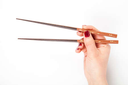 Wooden sticks in hand isolatedの写真素材