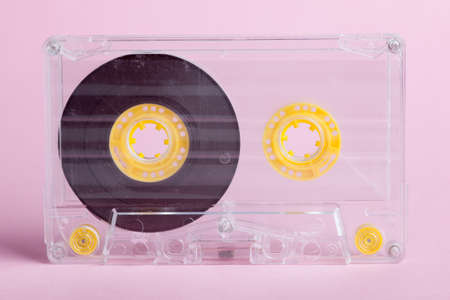 Audio cassette on pink backgroundの写真素材