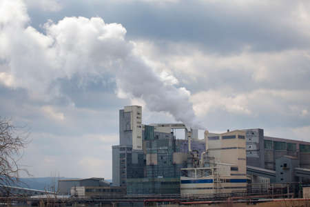 Chemical factory with smoke from the pipesの写真素材