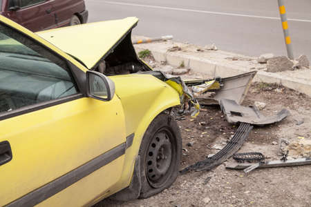 Traffic accident. Yellow crashed carの写真素材