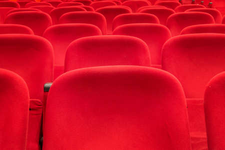 empty red cinema or theater seatsの写真素材