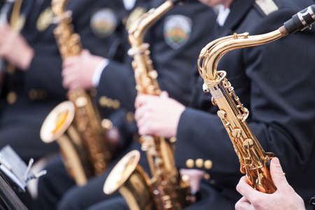 musicians are playing on Saxophoneの写真素材