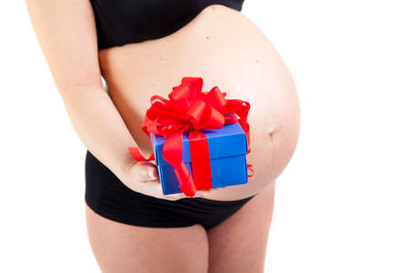 pregnant woman with gift boxの写真素材