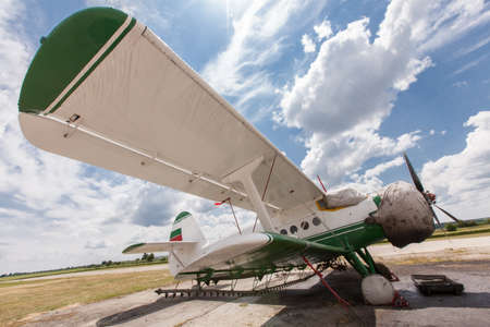 old airplane against a cloudy sky
