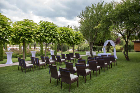 settings for a wedding in the gardenの写真素材