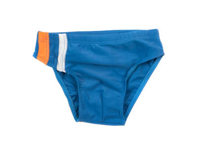 Blue children's swimming trunks. Bathing suit for boy, isolated on whiteの写真素材