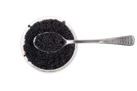 black caviar and spoon, isolated on whiteの写真素材