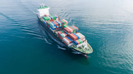 Large container ship at sea. Aerial top view of cargo container ship vessel import export container...