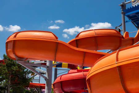 Water slide in water park. Aquapark slide, summer holidays