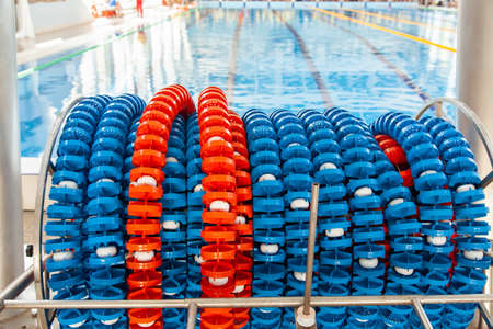 Swimming lanes markers in reel storage, near the pool. Pool lane lines for athletics, swimming.の写真素材
