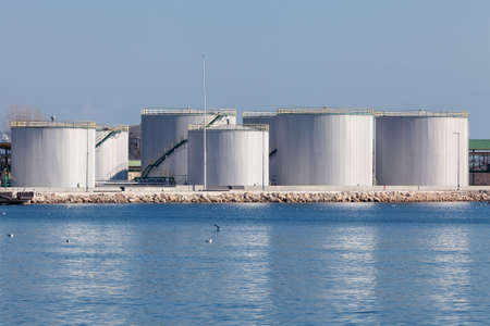 large tanks for petrol and oil, blue sky