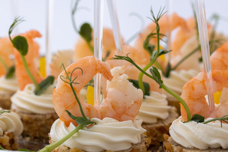 Set of beautiful canapes. Appetizer canape with shrimp. Cateringの写真素材