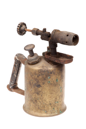 Old rusty blowtorch isolated on whiteの写真素材