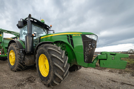 Balchik, Bulgaria, OCTOBER 30, 2021 - John deere farm Tractor. John Deere is American corporation...