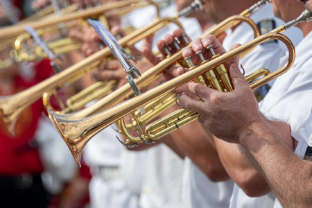 Musicians are playing on trumpets