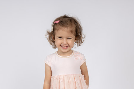 Cute little girl posing and smile