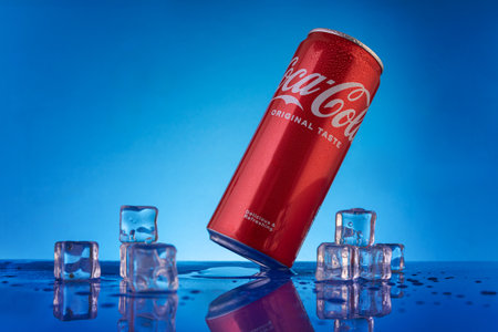 Varna, BULGARIA - APRIL 22, 2024: Classic Coca Cola original taste, red can with water drops and ice...