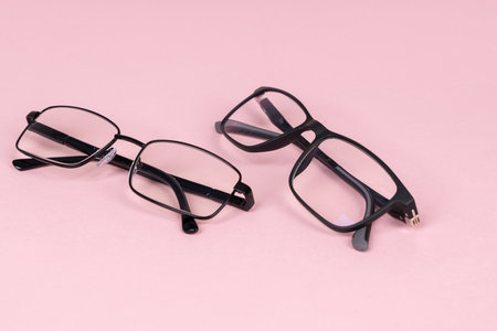 Modern Black Eyeglasses: Two Pairs with Different Frames (Metal & Plastic). Modern Eyewear Fashion,...