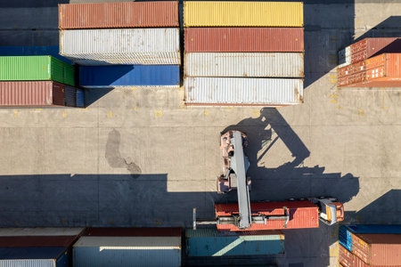 Aerial view of port container terminal. Industrial cargo harbor. Container Handlerの写真素材