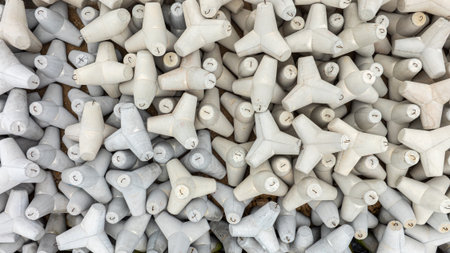 Aerial view of concrete tetrapod. Concrete tetrapods line.  Coastal protection. Wave breakersの写真素材