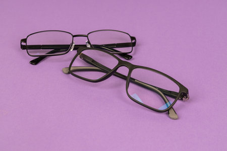 Modern Black Eyeglasses: Two Pairs with Different Frames (Metal & Plastic). Modern Eyewear Fashion,...