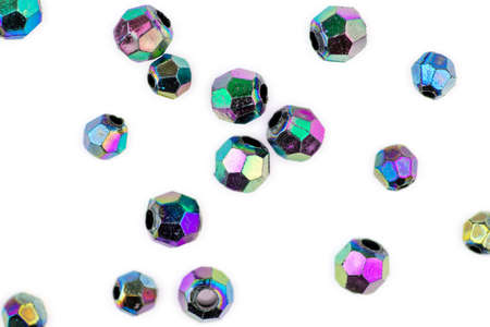 Faceted multi-colored beads isolated against whiteの写真素材