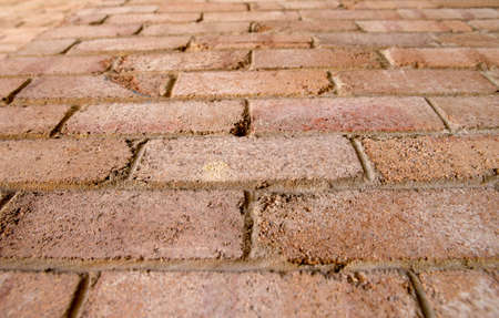 Cracked and weathered old brick wall in Sydney, Australiaの写真素材