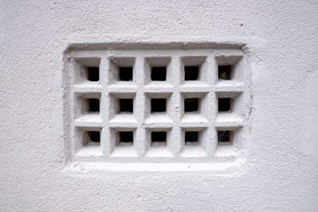 Closeup of vintage rustic old fashioned air ventilation grilleの写真素材