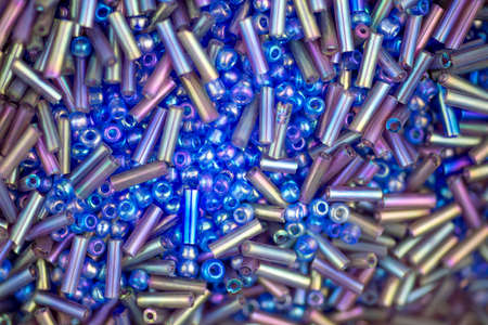 Macro closeup of blue and multi-colored beadsの写真素材
