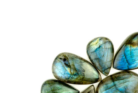 Beautiful labradorite gemstones isolated on white with background copyspaceの写真素材