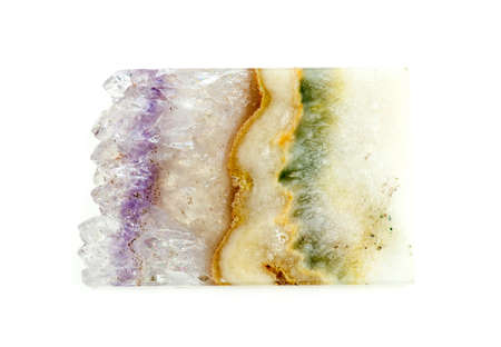 Beautiful slice of quartz geode gemstone with layers of moss and lace agateの写真素材