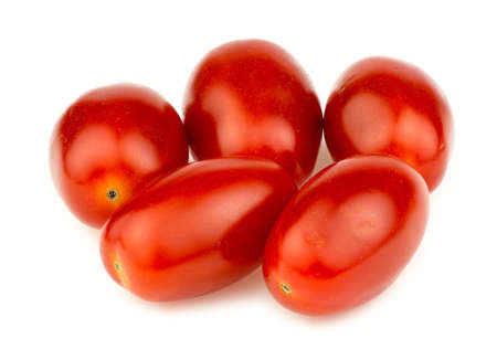 Plump cherry tomatoes on whiteの写真素材
