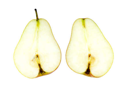 Halved juicy corella pear isolated on whiteの写真素材
