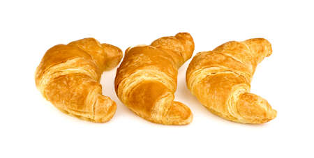 Three butter croissant isolated on white backgroundの写真素材