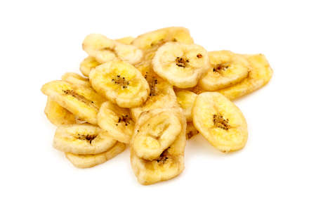 Isolated pile of banana chipsの写真素材