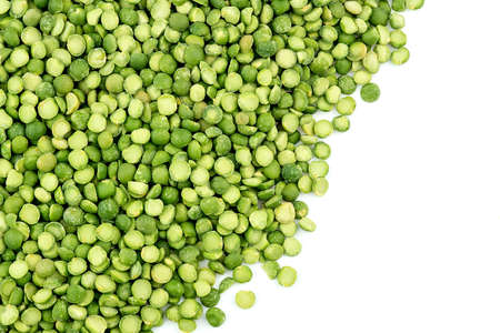 Green split peas isolated against white vegetarian backgroundの写真素材