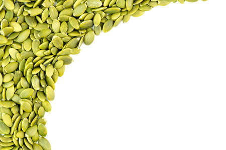 Background texture of fresh green pumpkin seedsの写真素材