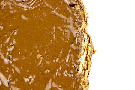 Closeup macro of chocolate hazelnut spread on breadの写真素材