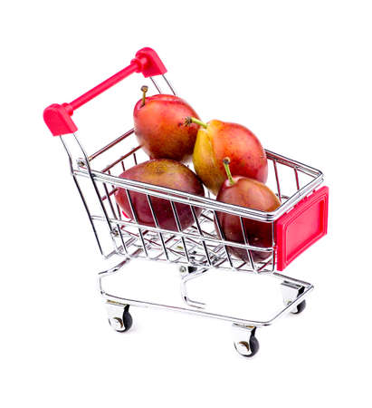 Gigantic sugar plums in shopping cartの写真素材