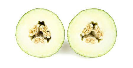 Sliced halves of delicious christmas melonの写真素材